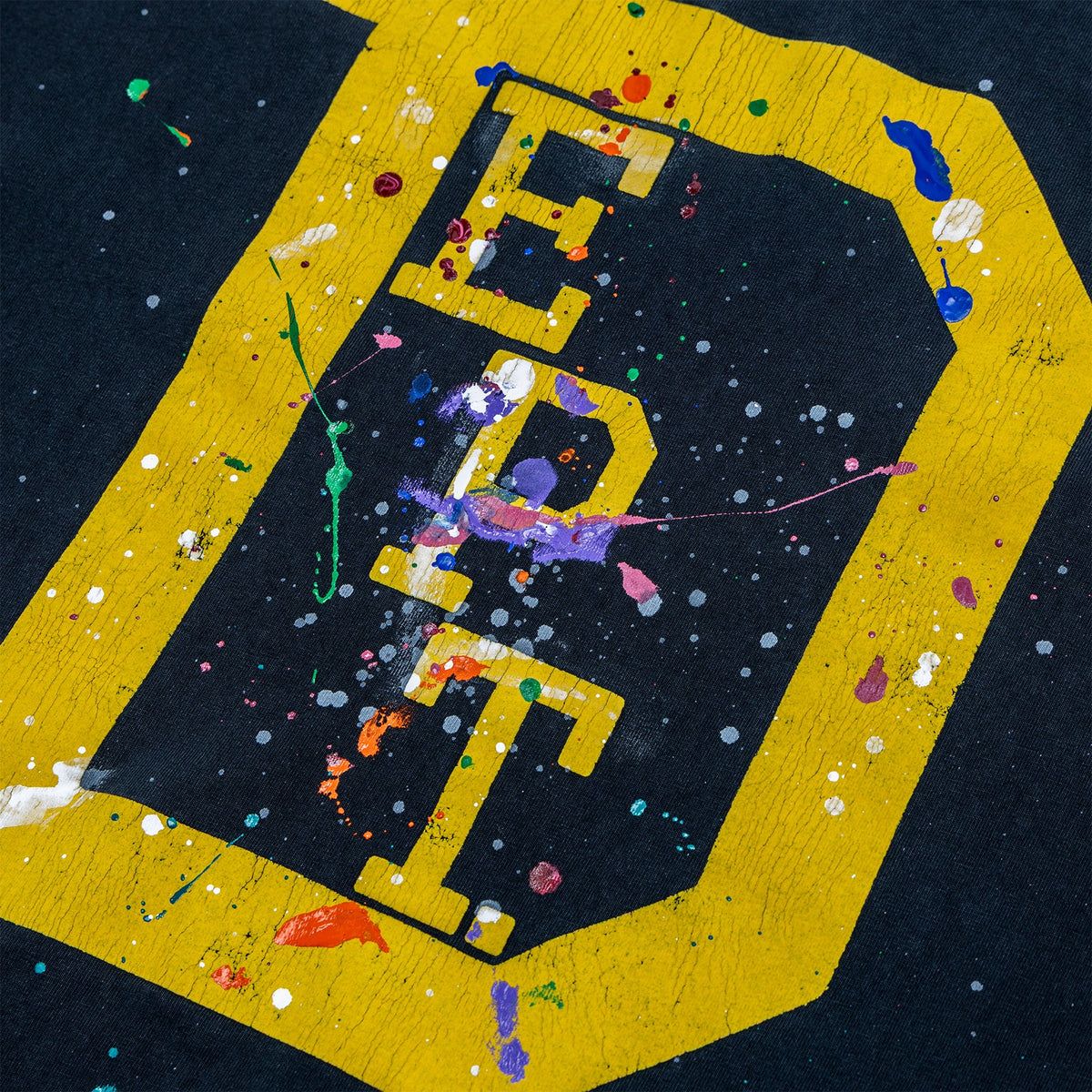 UNIVERSITY GRAPHIC PAINTED TEE